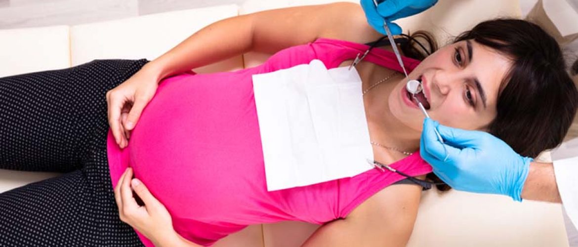 Mẹ bầu có nên nhổ răng khi mang thai không?